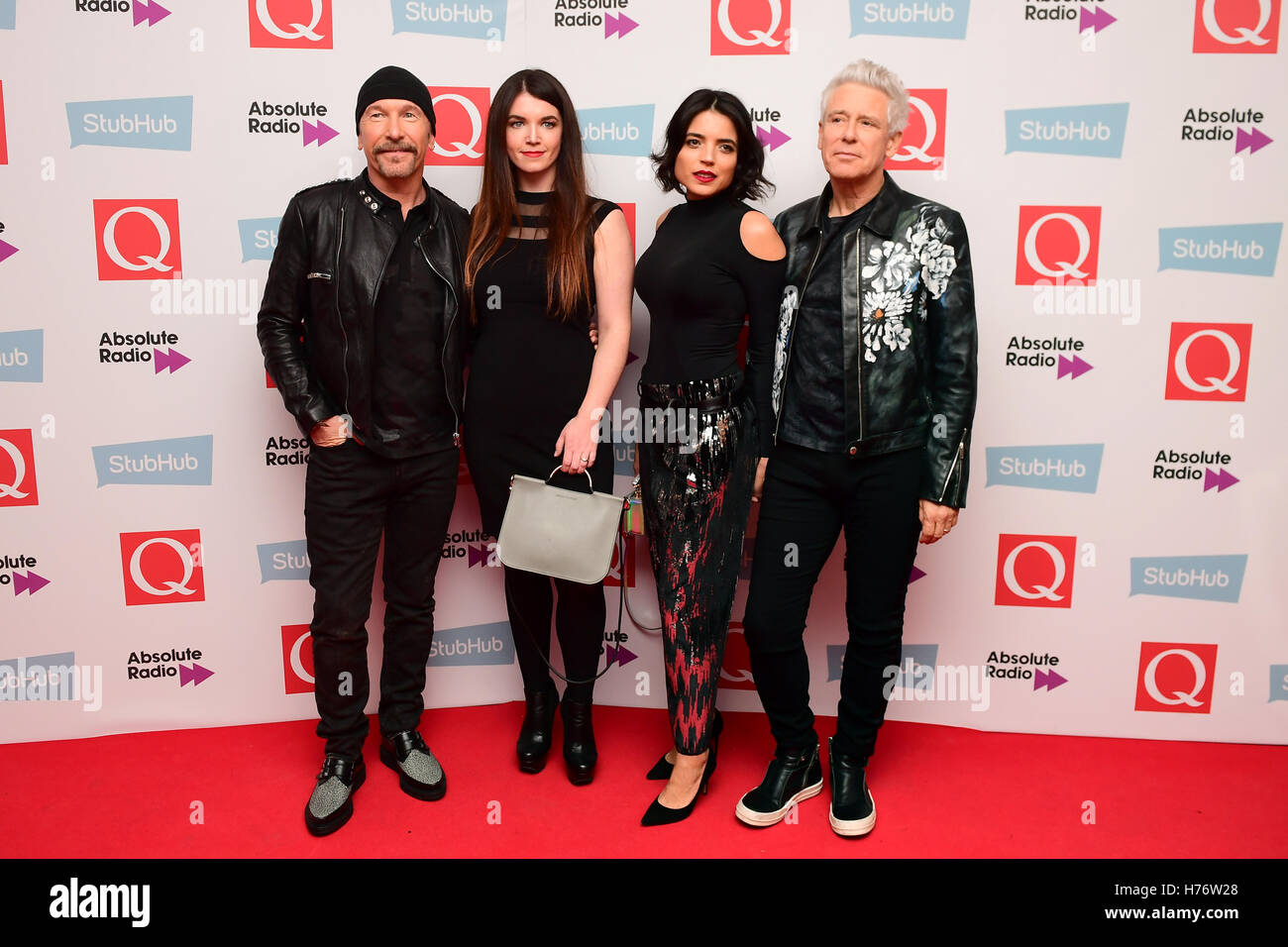 (left-right) The Edge, his guest, Mariana Teixeira De Carvalho and Adam Clayton attending the Stubhub Q Awards 2016, in association with Absolute Radio, at the Roundhouse, London. Stock Photo