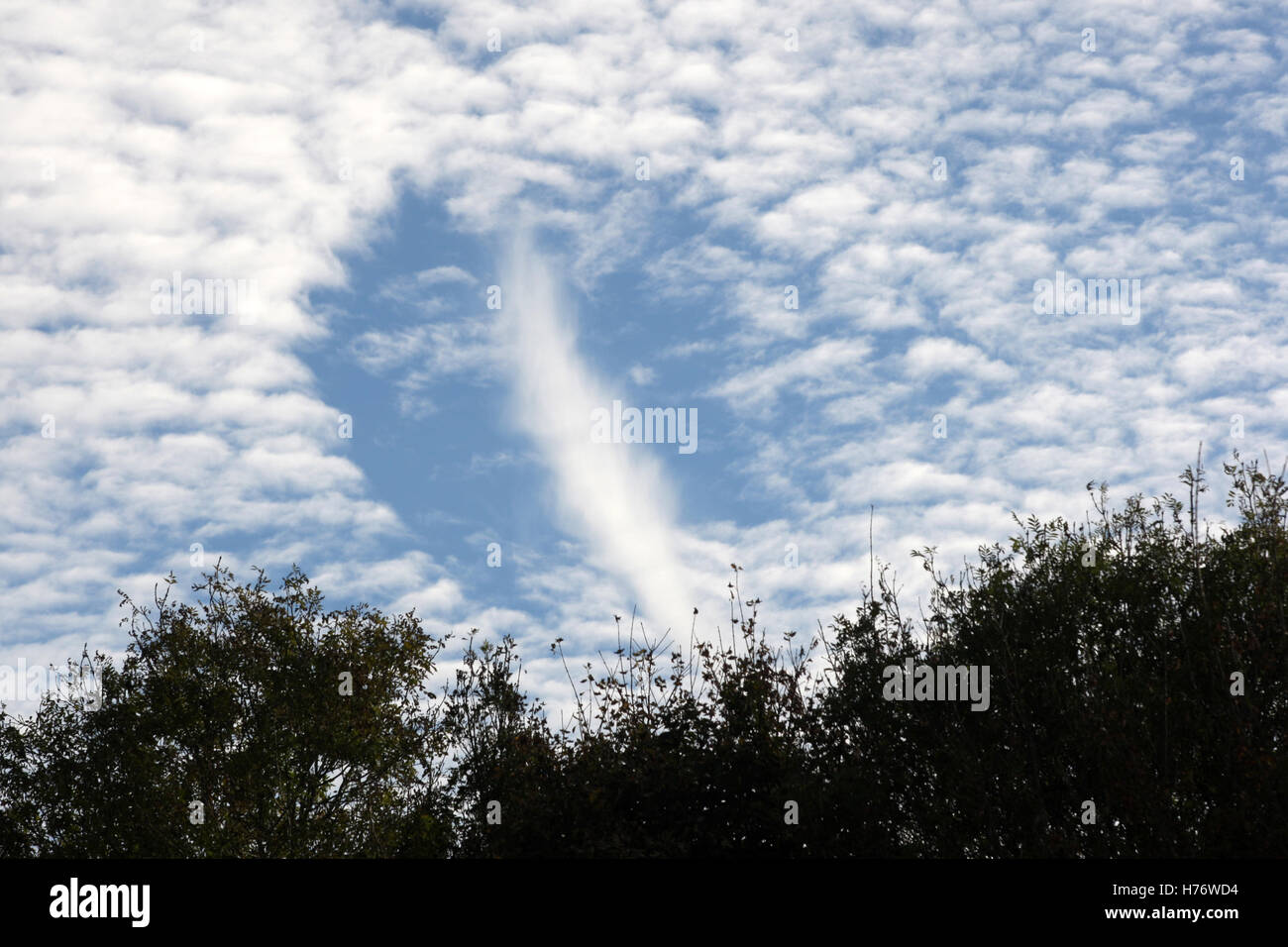 Hole Punch cloud, Worthing, West Sussex, England, October 2016. Stock Photo
