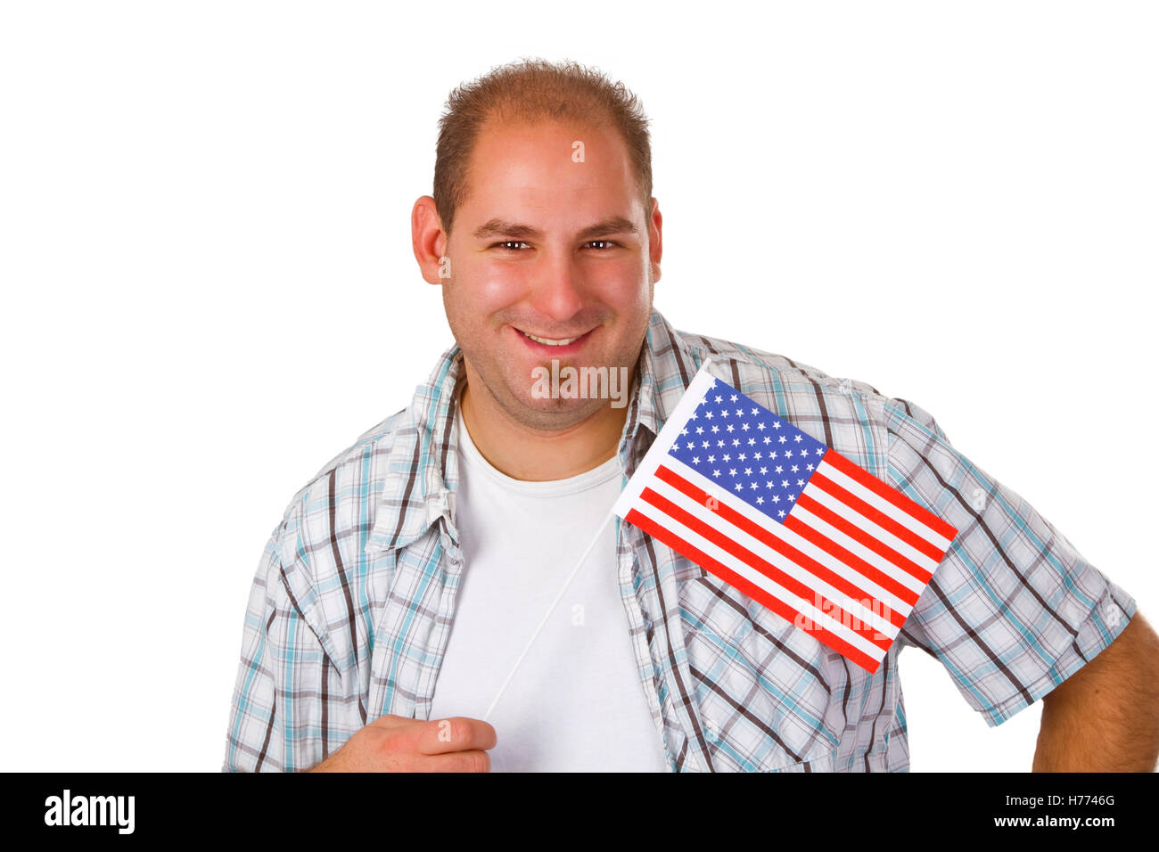 Young man holding American flag isolated on white background Stock ...