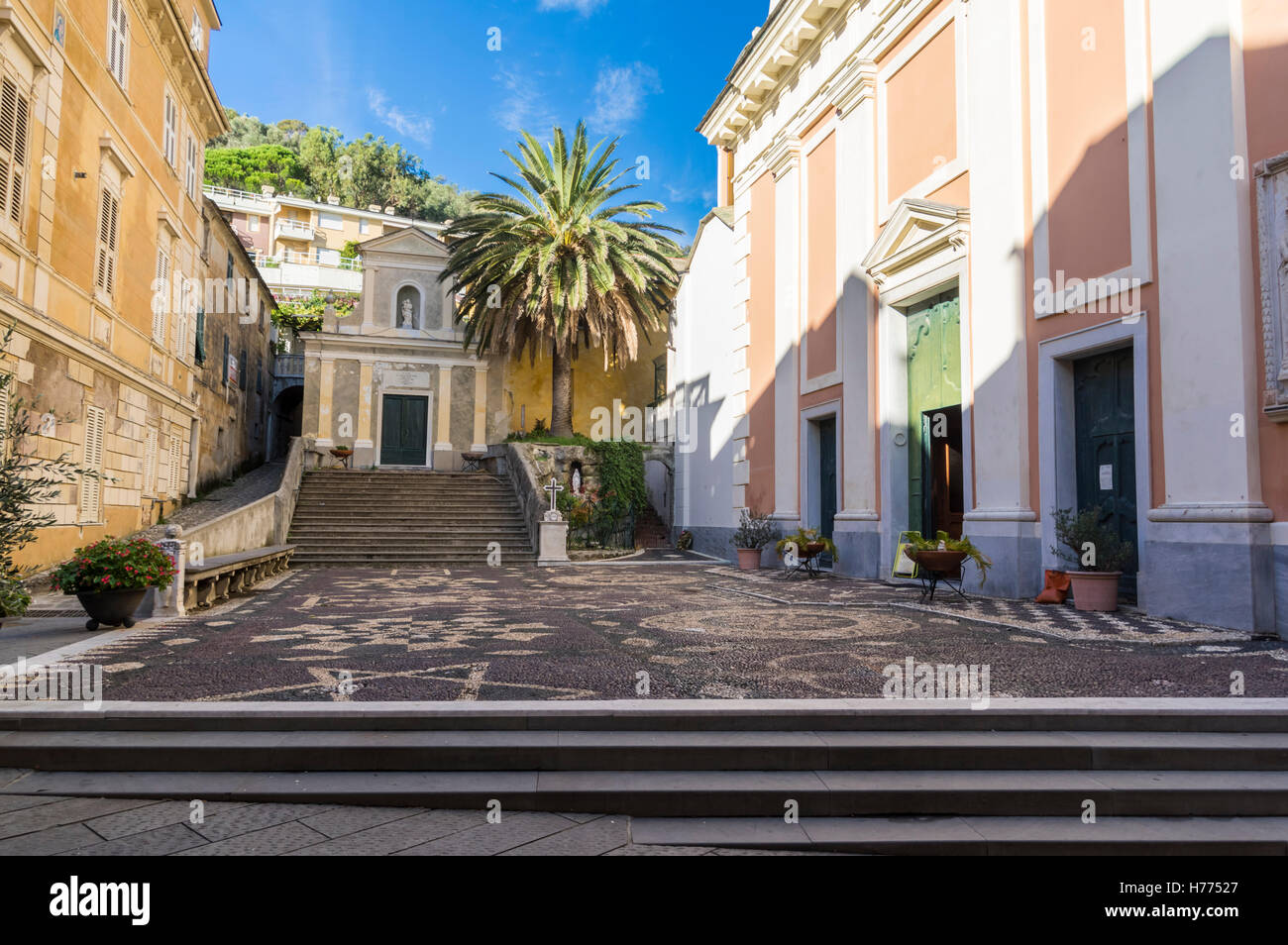 Small cobblestone-paved square in the town center of Moneglia, Liguria, Italy. Stock Photo