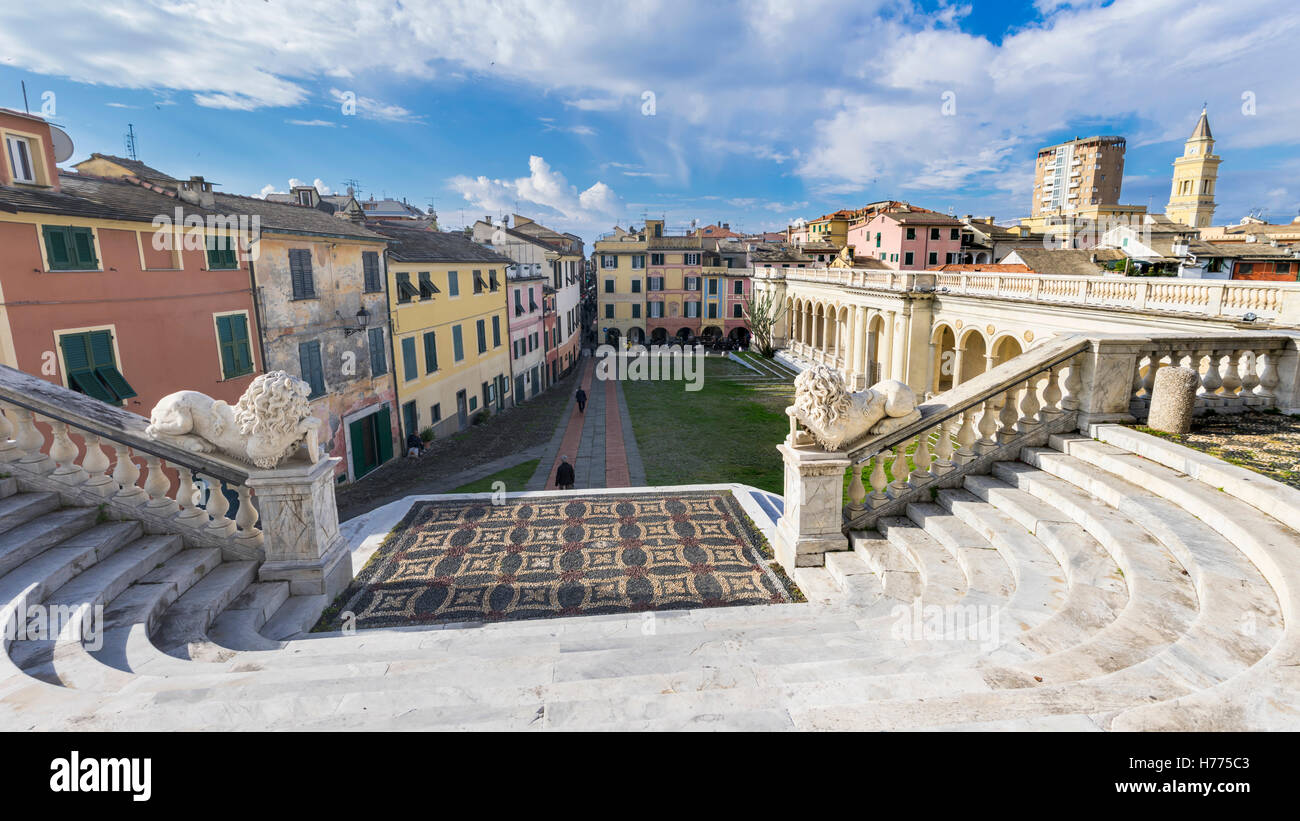 Flight of outdoor stairs leading to Piazza Guglielmo Marconi in the town of Lavagna, Liguria, Italy, as seen from the entrance of the basilica. Stock Photo