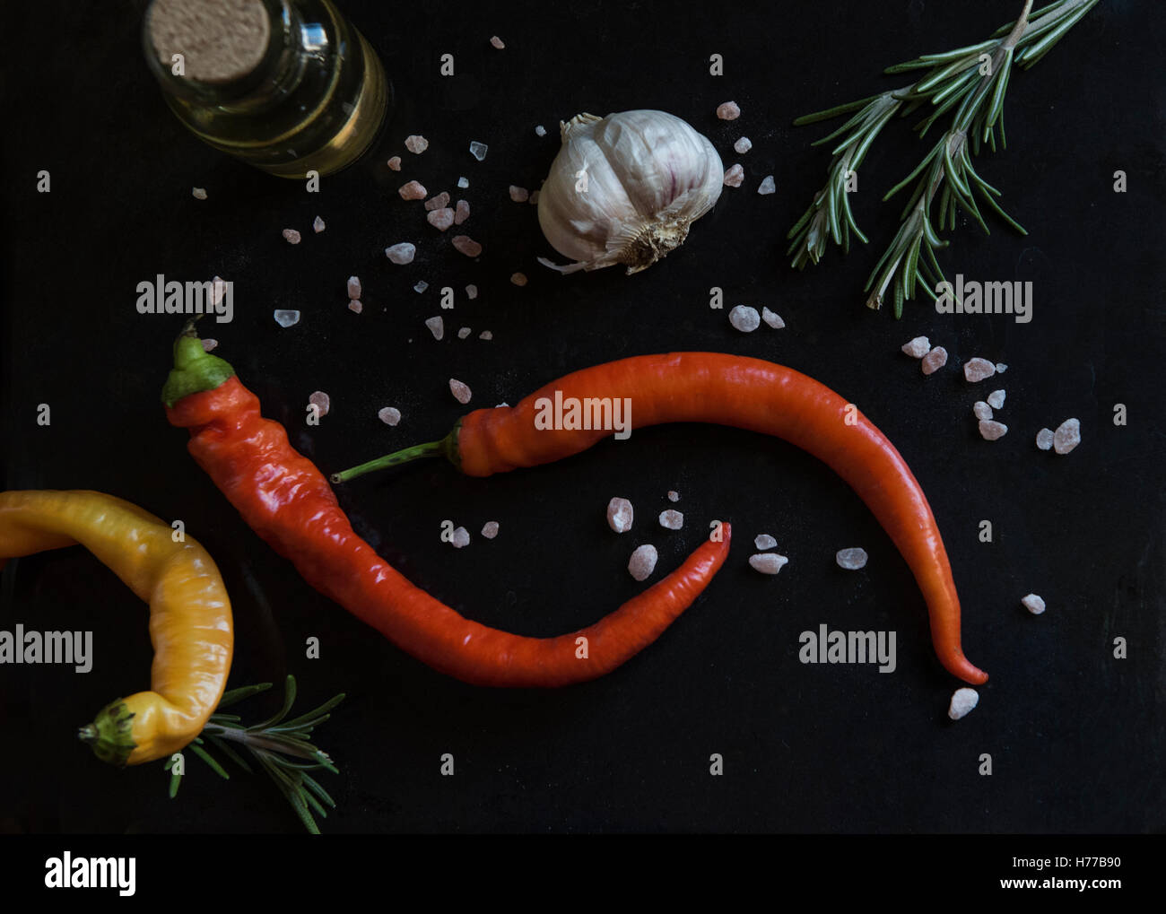 Chili peppers, garlic, rosemary, salt and olive oil Stock Photo Alamy