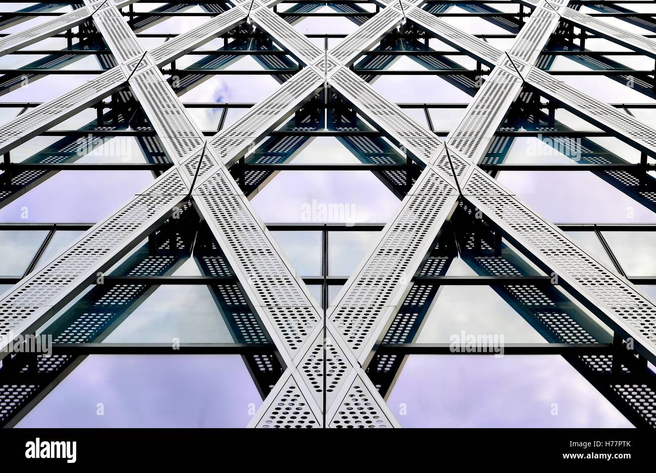 Futuristic facade of a glass and steel office building in downtown ...