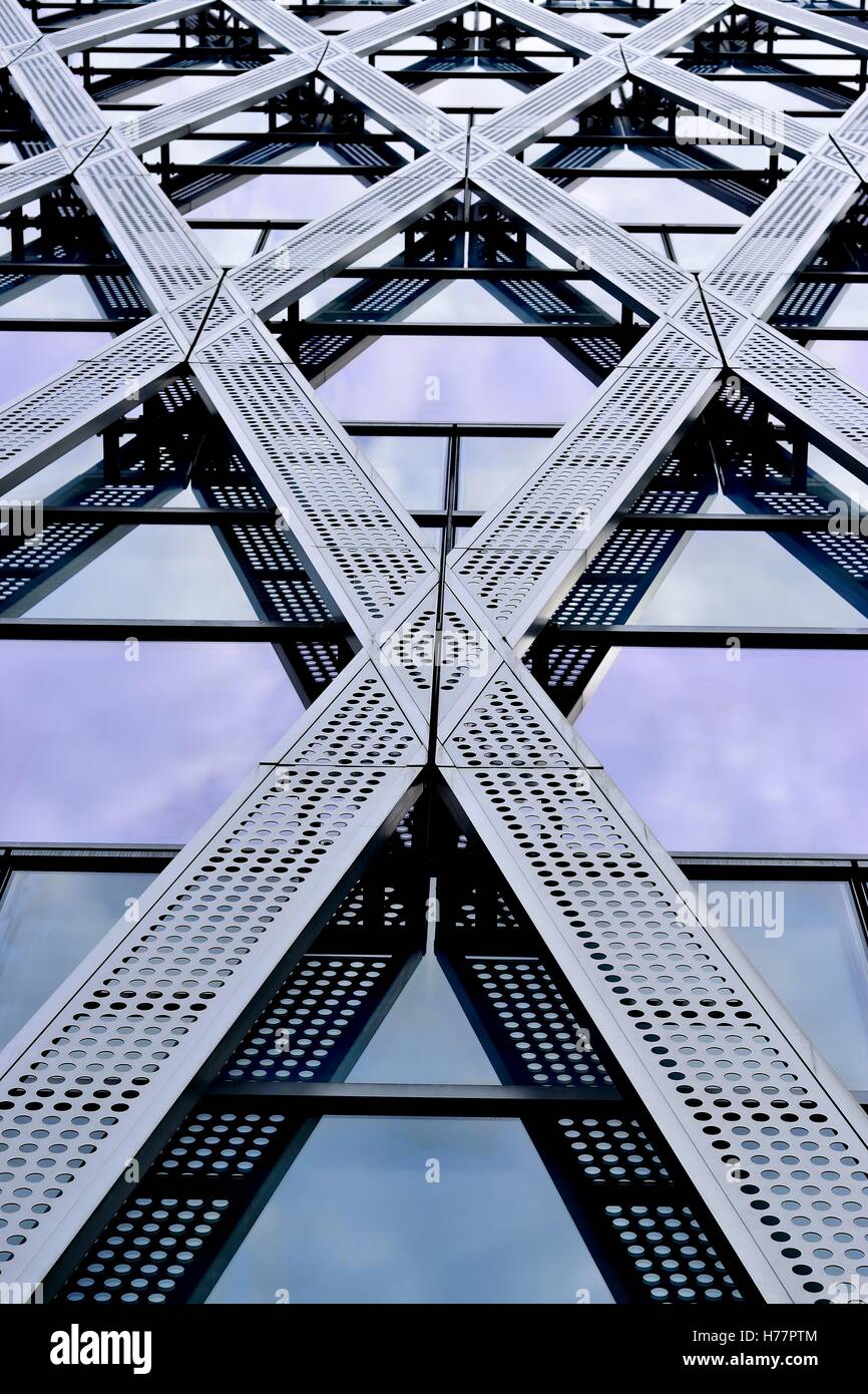 Futuristic facade of a glass and steel office building in downtown ...