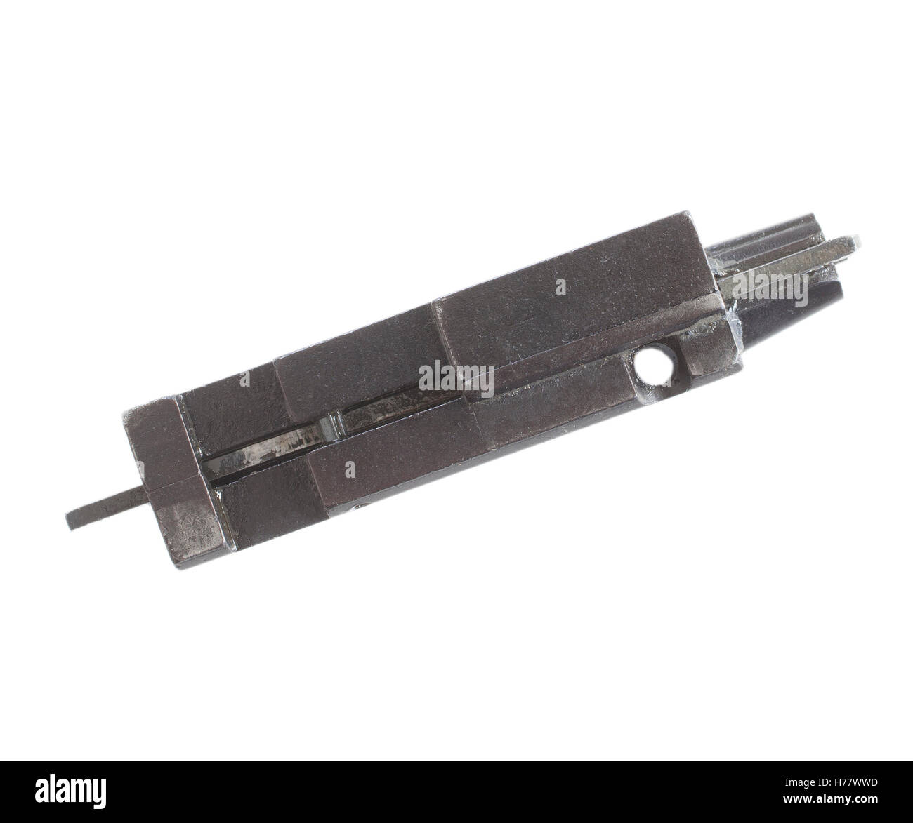 Gun piece that carries the firing pin and extractor isolated on white