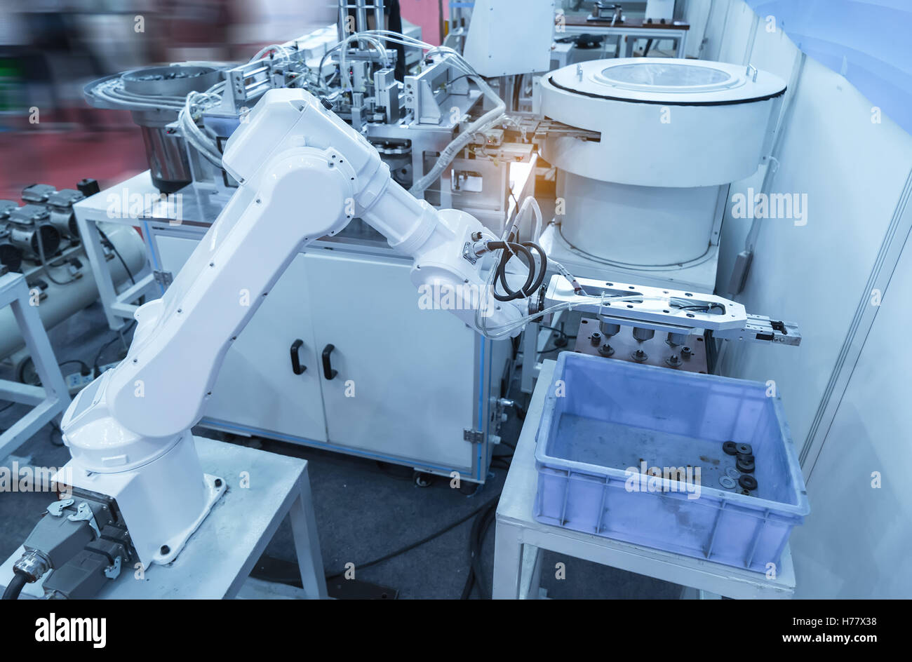 Robotic arm at production line in factory Stock Photo - Alamy