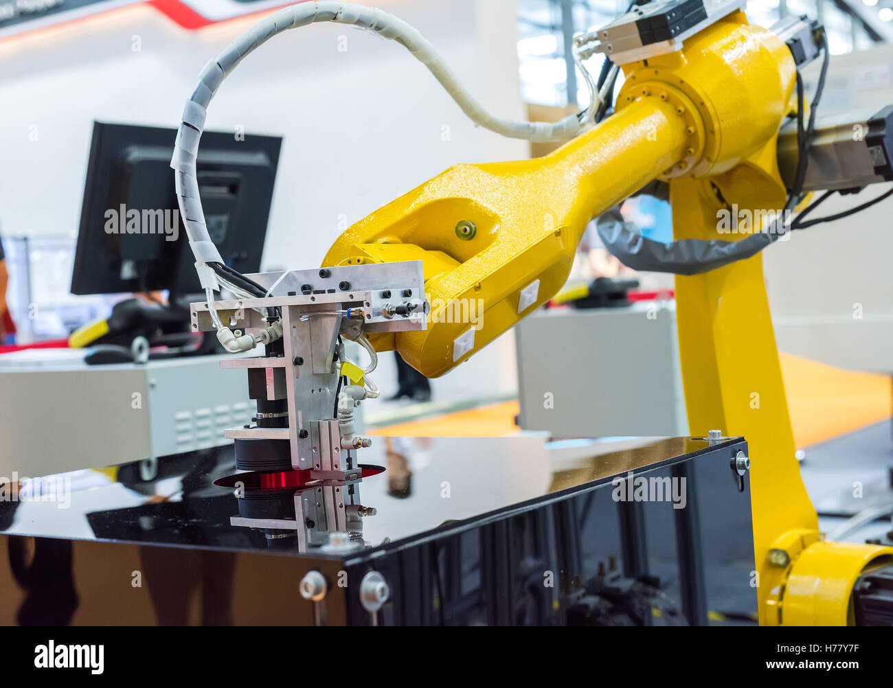 Robotic arm at production line in factory Stock Photo - Alamy