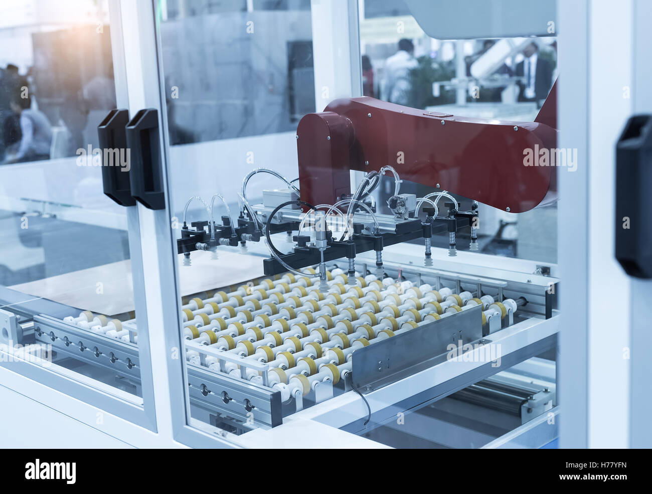 Robotic arm at production line in factory Stock Photo - Alamy