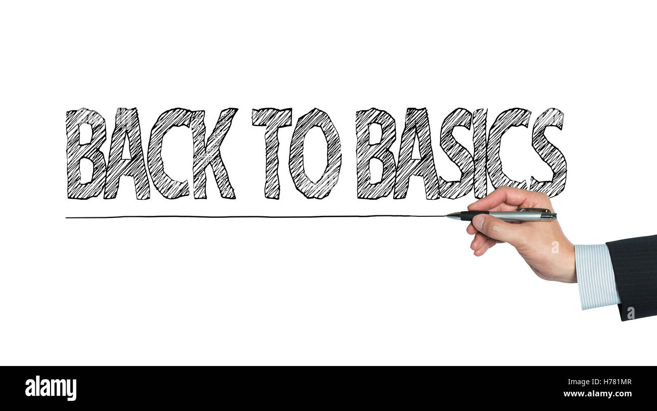 back to basics written by hand, hand writing on transparent board, photo Stock Photo
