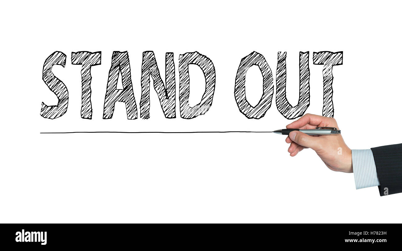 stand out written by hand, hand writing on transparent board, photo Stock Photo