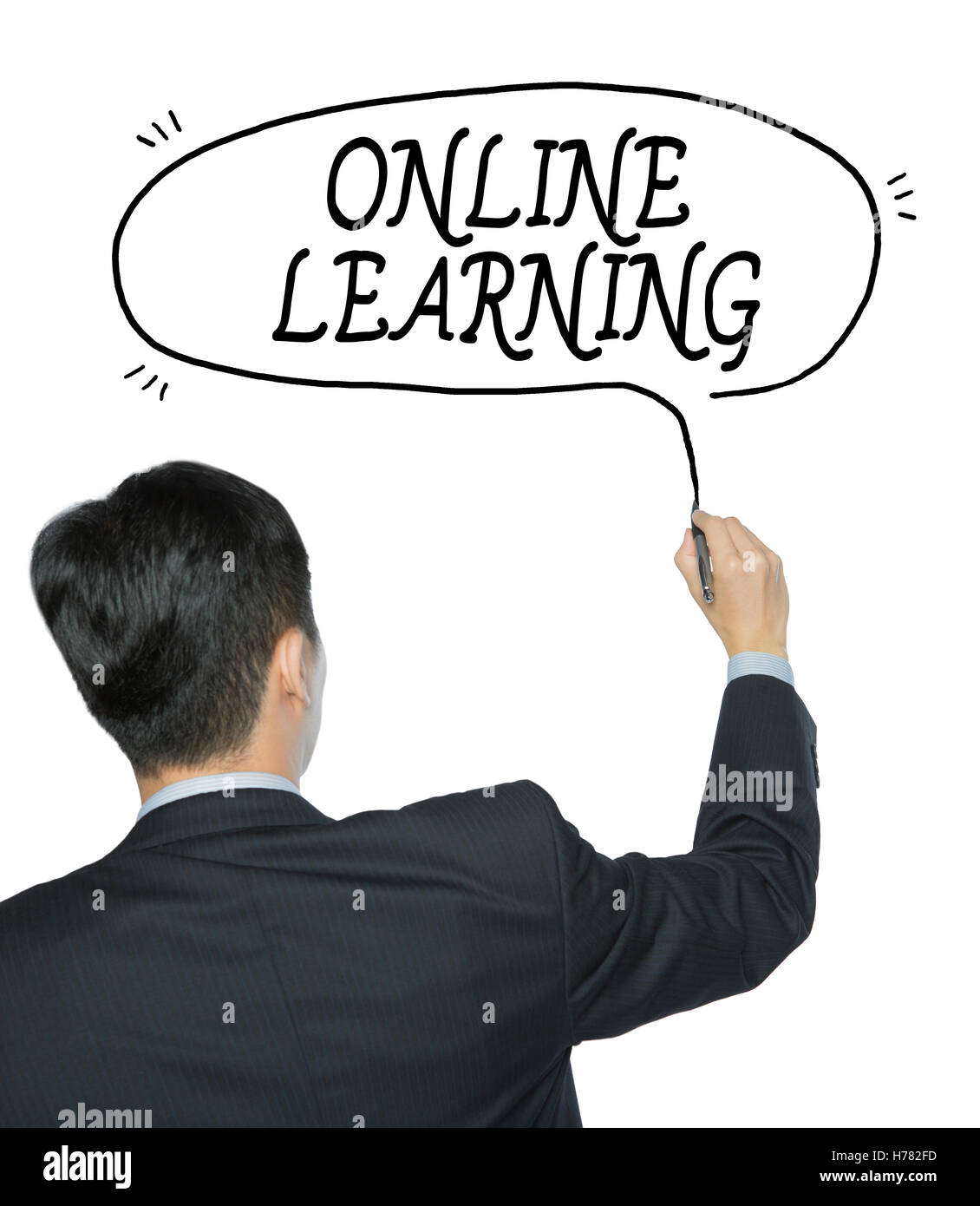 online learning written by businessman in black suit, hand writing on transparent board, photo Stock Photo