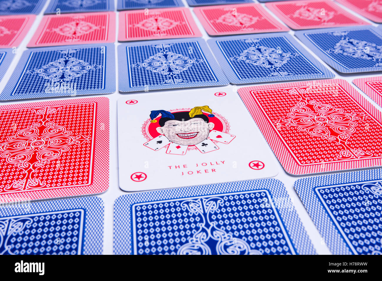 joker card among some playing cards Stock Photo