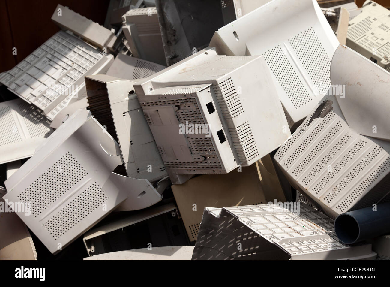 A pile of old broken monitor plastic shells ready for recycling. Stock Photo