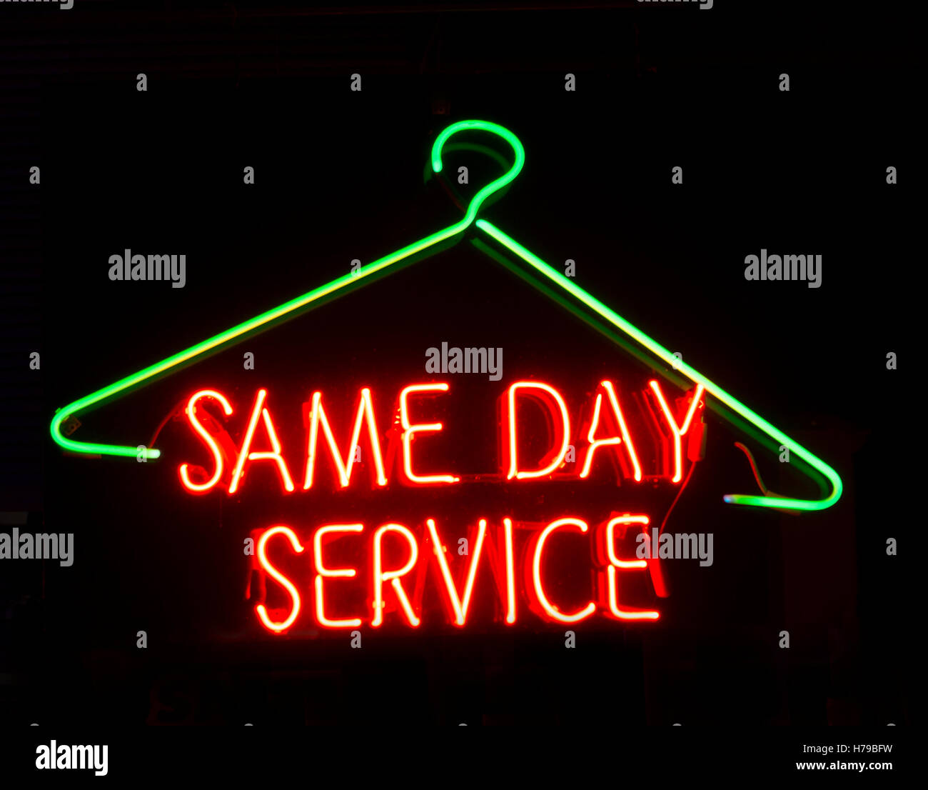 neon sign dry cleaning store window Stock Photo Alamy