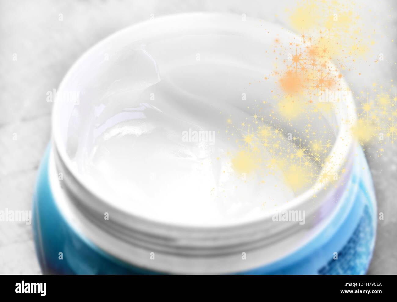 White face cream in blue jar closeup Stock Photo