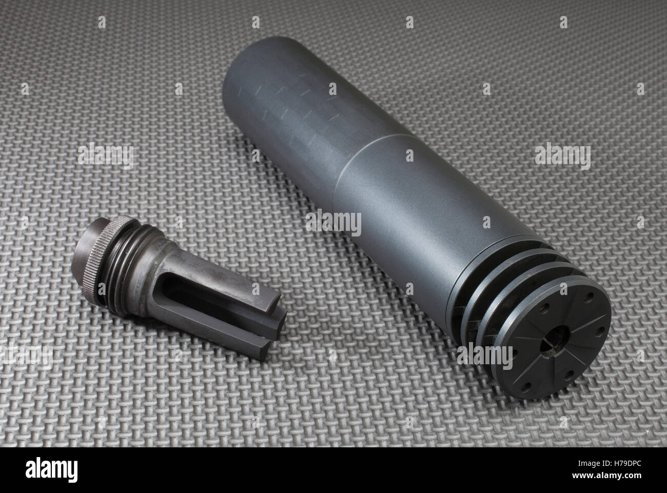 Suppressor and the mount that allows it to stay on a rifle barrel Stock ...