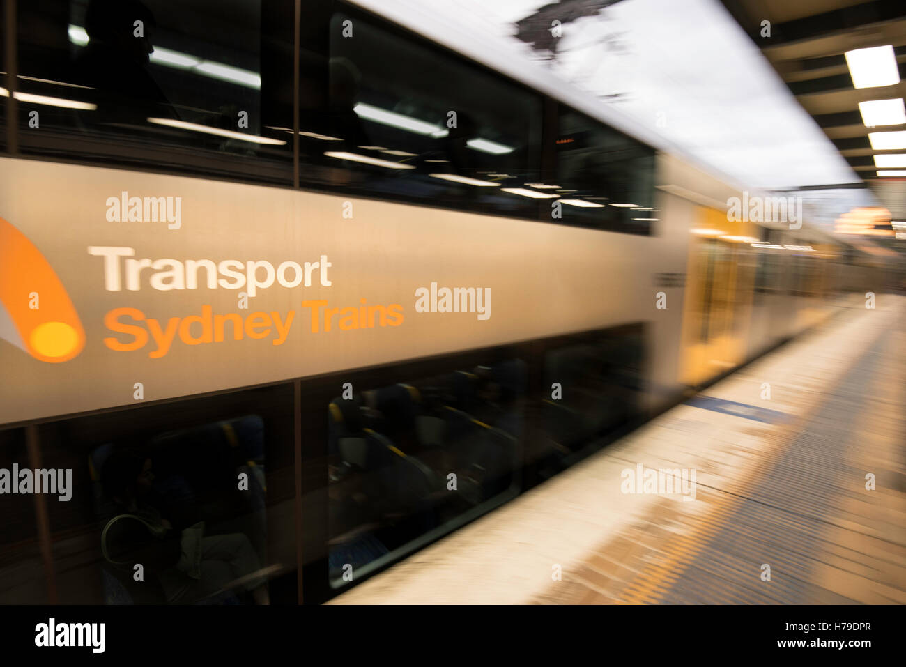 A blurred image of a modern Waratah A Series Sydney train moving