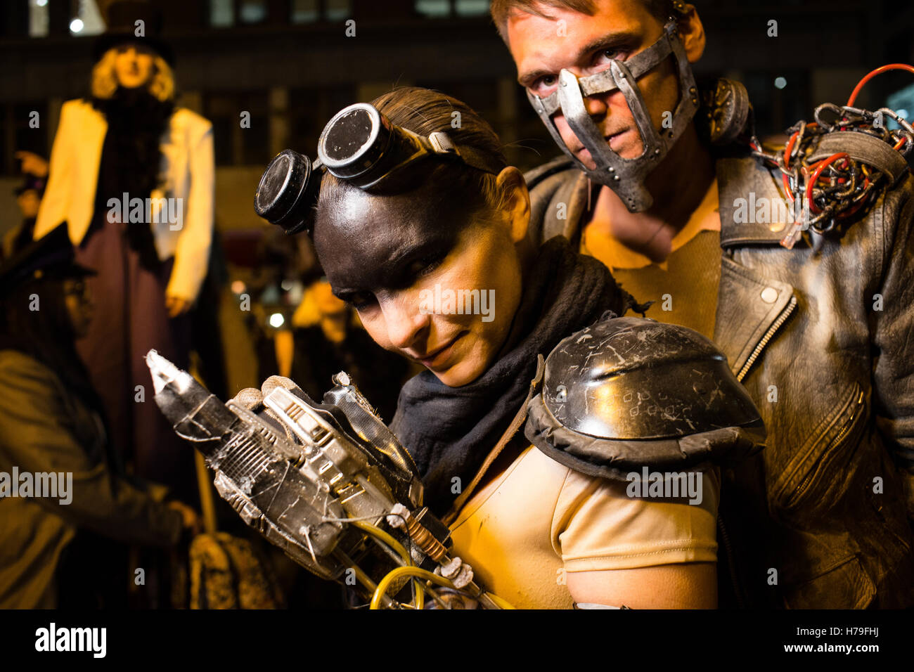 New York, NY - 31 October 2016. A man and a woman costumed as steampunk or Game of Thrones characters in the Greenwich Village H Stock Photo