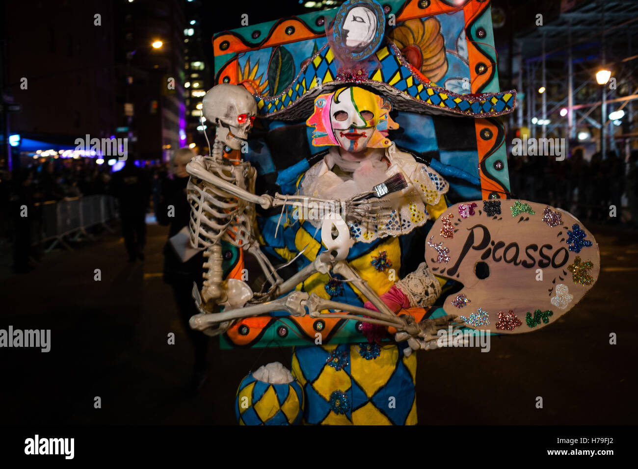New York, NY - 31 October 2016. A parade goer costumed as a painting of a  harlequin carrying a skeleton by Pablo Picasso in the Stock Photo - Alamy