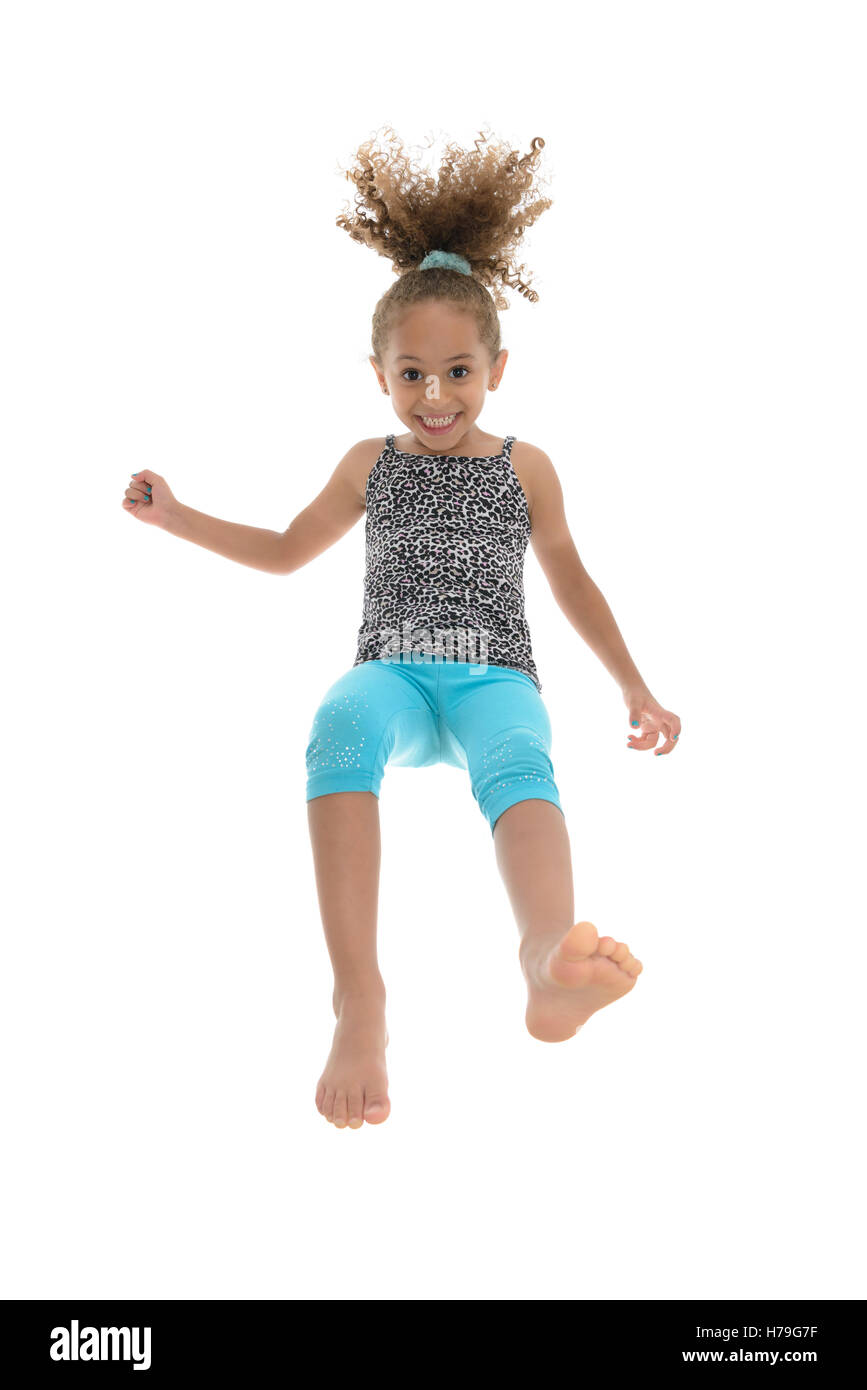 Active Young Joyful Girl Jumping With Joy Isolated on White Background Stock Photo