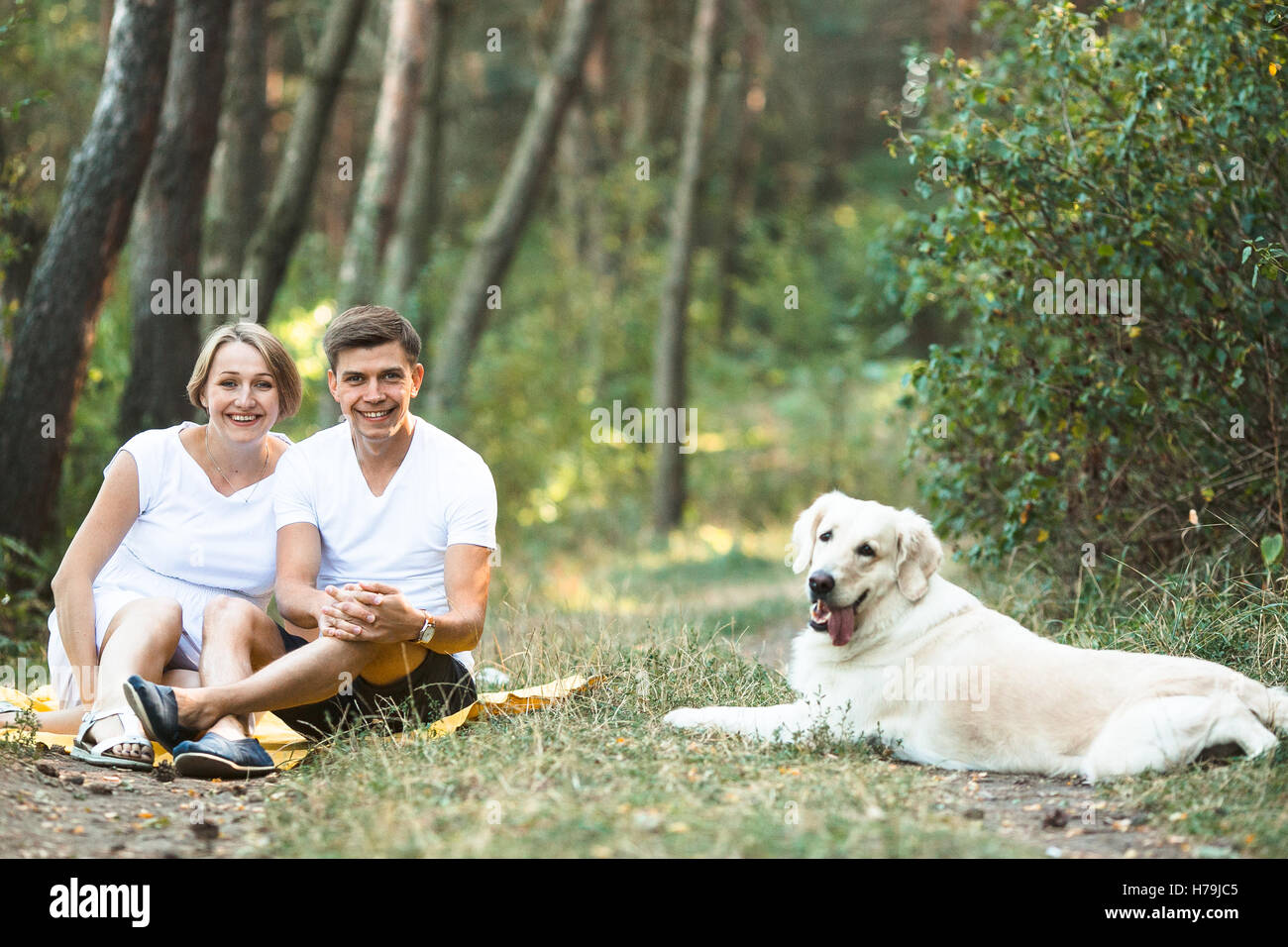 Happy young couple expecting baby Stock Photo - Alamy