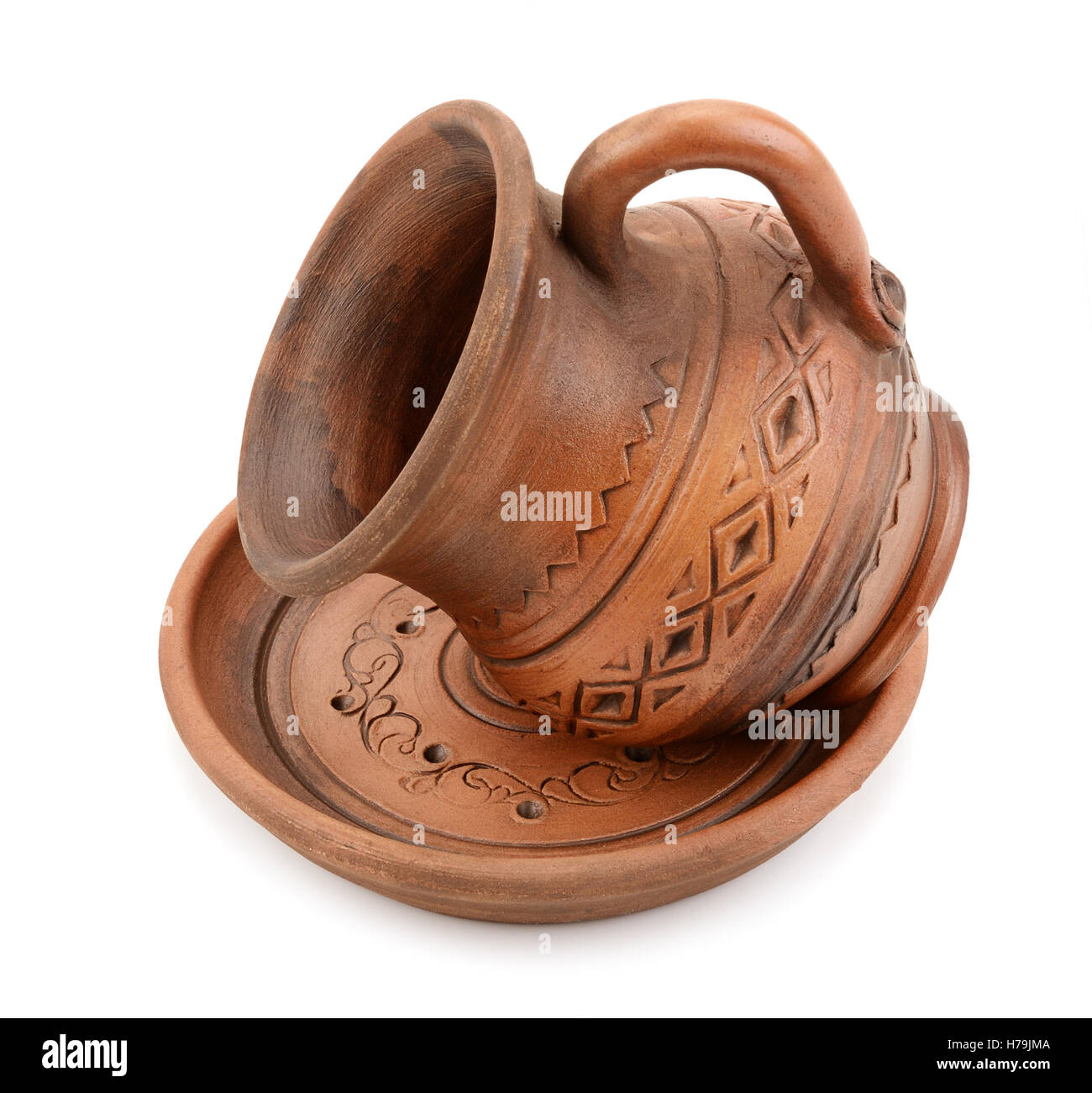 clay cup and saucer isolated on white background Stock Photo Alamy