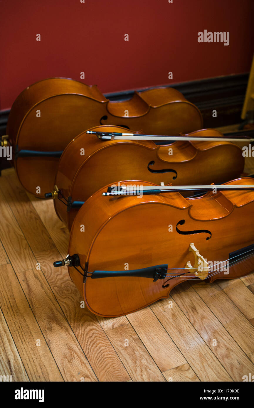 Group of violins at musical recital. Stock Photo
