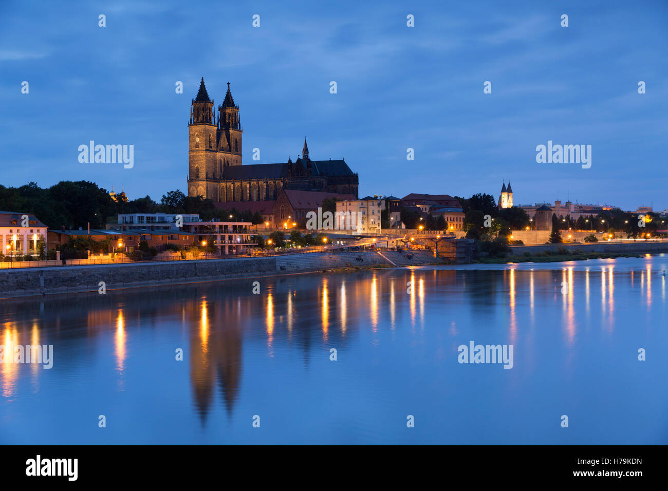 St Mauritius and St Katharina Cathedral and River Elbe at dusk, Magdeburg, Saxony-Anhalt, Germany Stock Photo