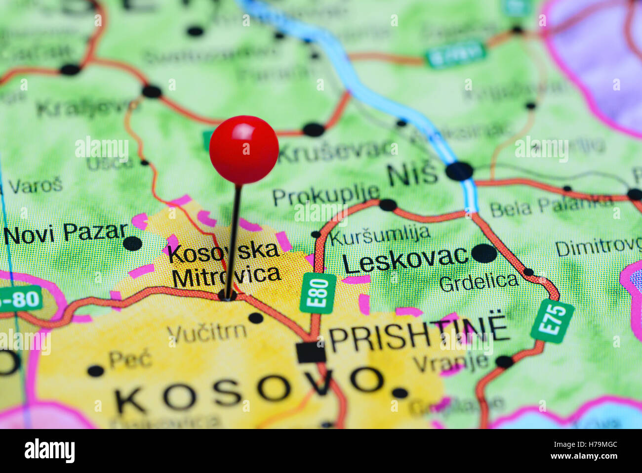 Kosovska Mitrovica pinned on a map of Kosovo Stock Photo