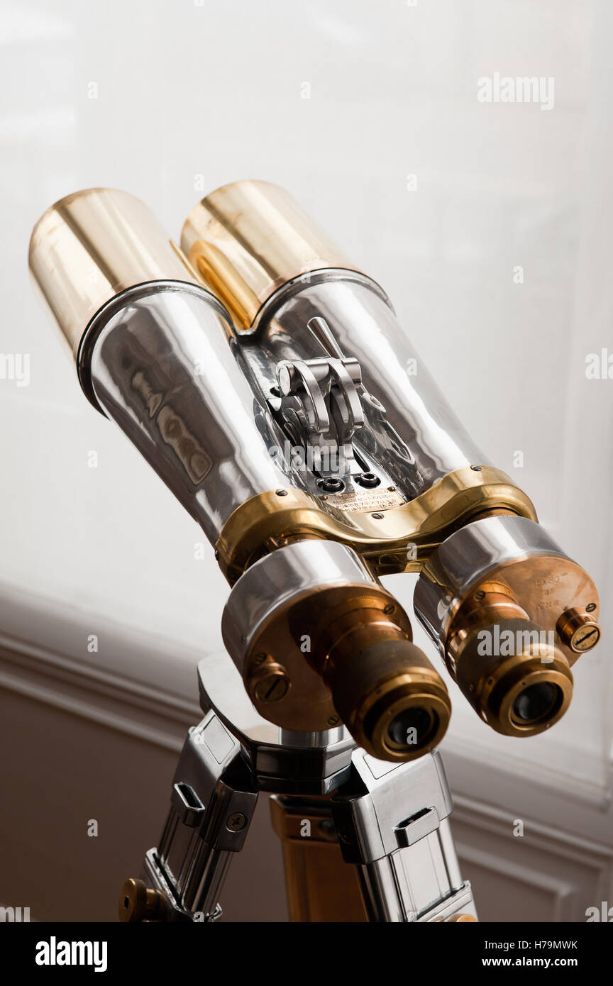 Pair of vintage binoculars on tripod Stock Photo