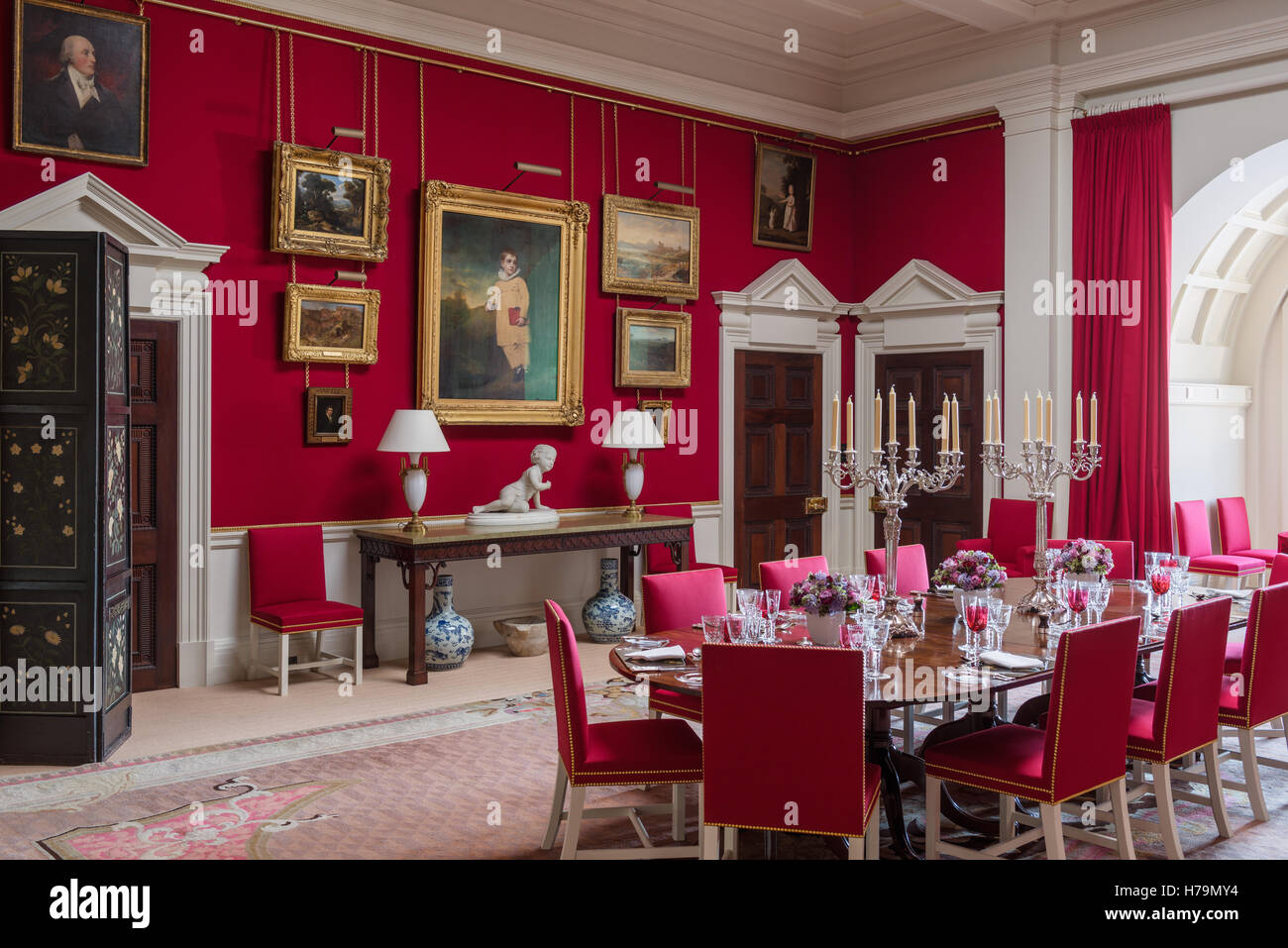 Red dining room in 18th century Dumfries house, Ayrshire, Scotland Stock Photo