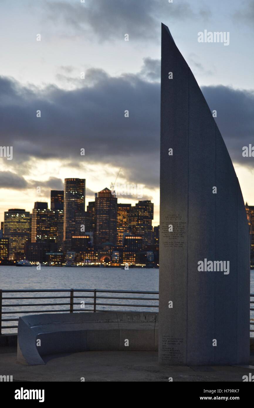 The downtown Boston skyline at sunset, seen from across Boston Harbor. Stock Photo