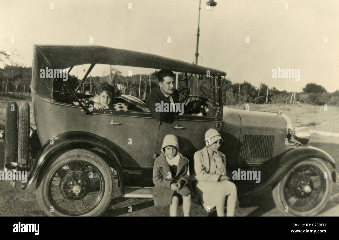 Family with their FIAT 508 Balilla Spider car, Italy Stock Photo