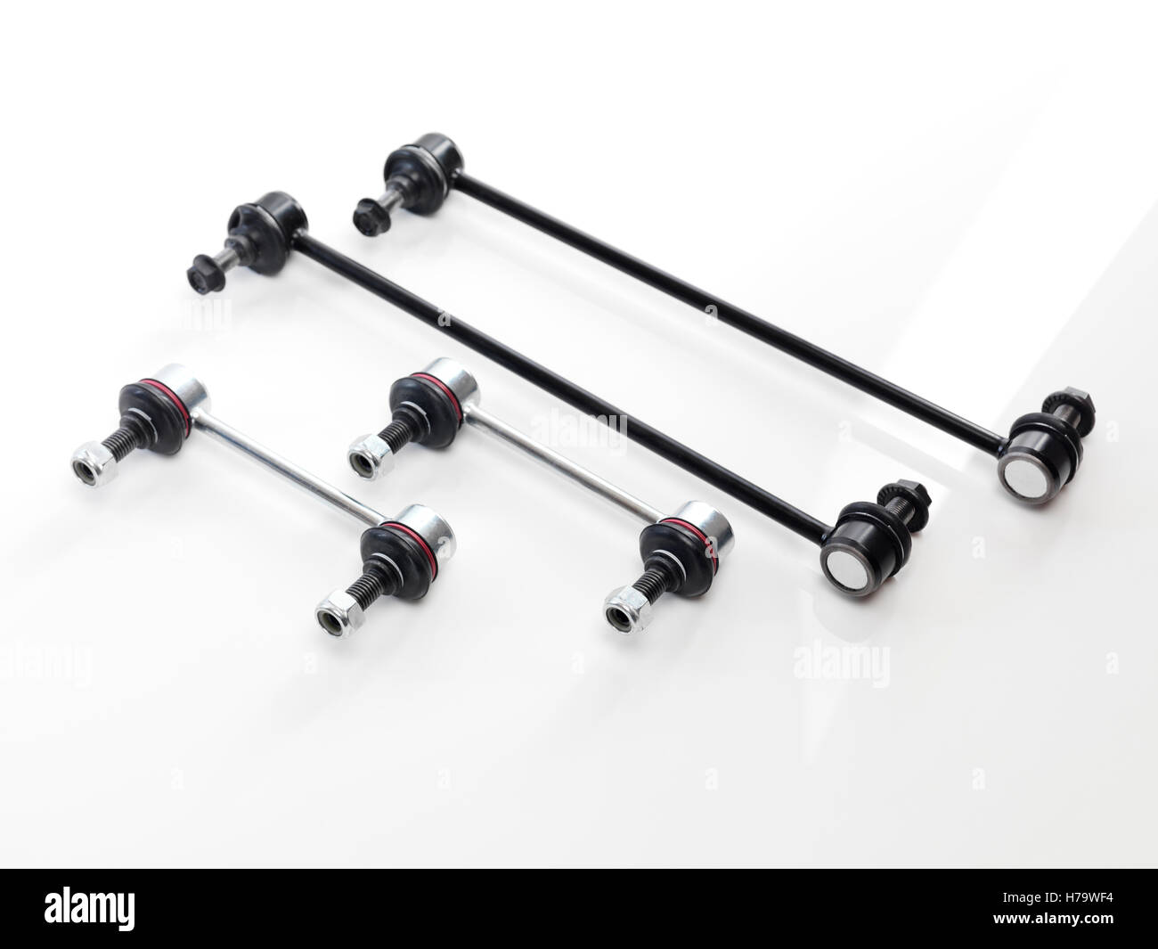 Volvo auto part Set of front and back sway bar end links automotive suspension parts isolated on