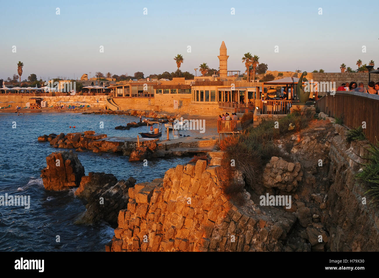 Caesarea ancient port at sunset, Israel Stock Photo