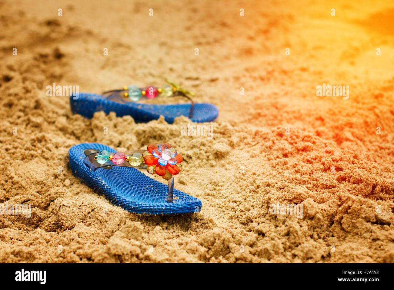Beach flip flops on tropical sandy coast. Holiday concept Stock Photo ...