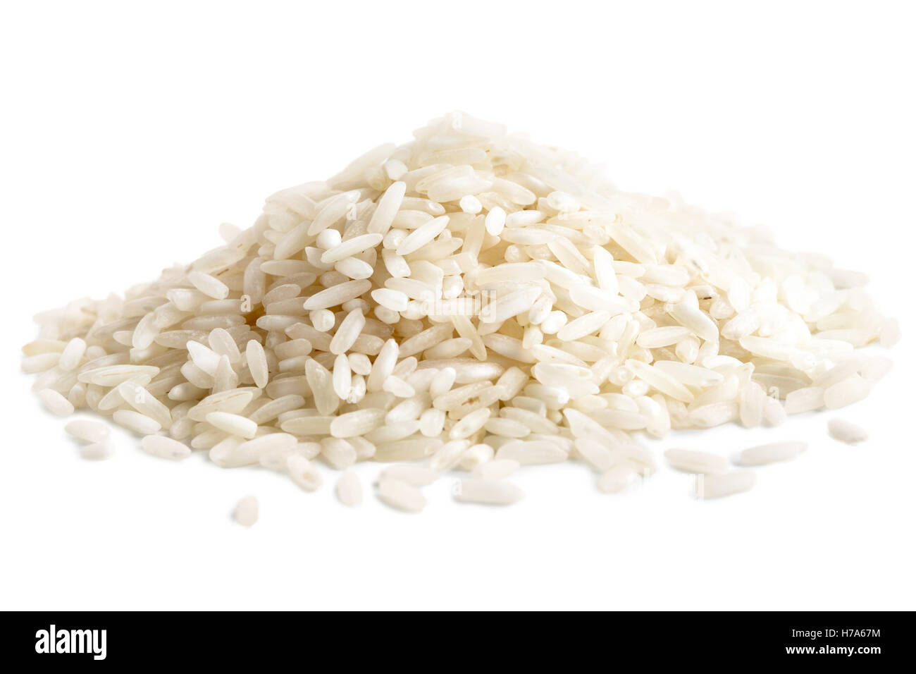 Pile of long grain white rice isolated on white. Stock Photo