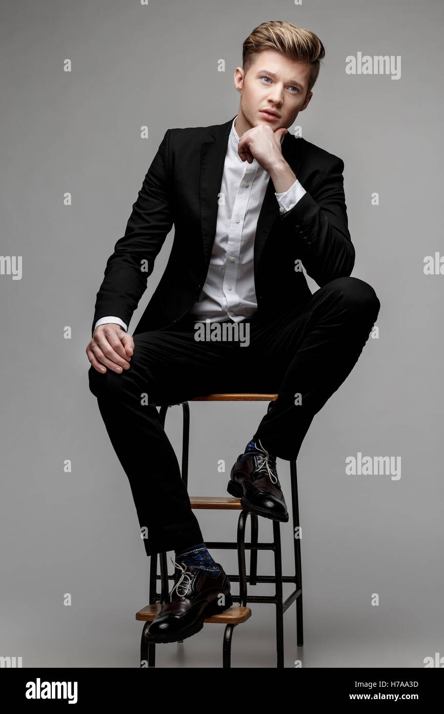 Portrait of a young handsome business man Stock Photo - Alamy