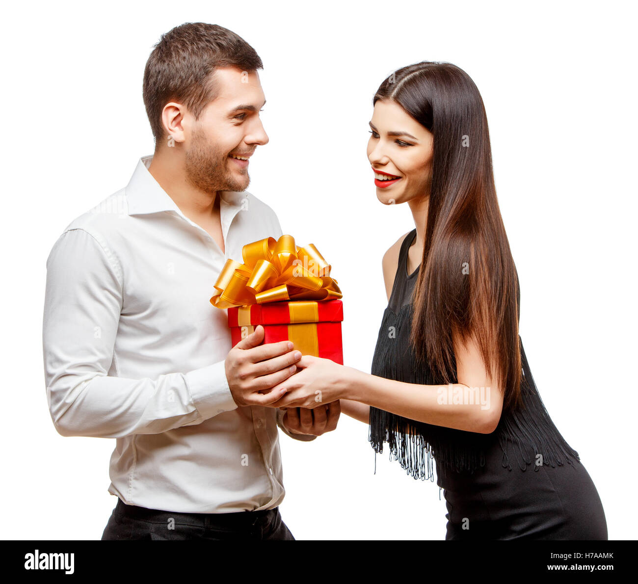 Partner Present Young beautiful couple with present isolated on white Stock Photo - Alamy