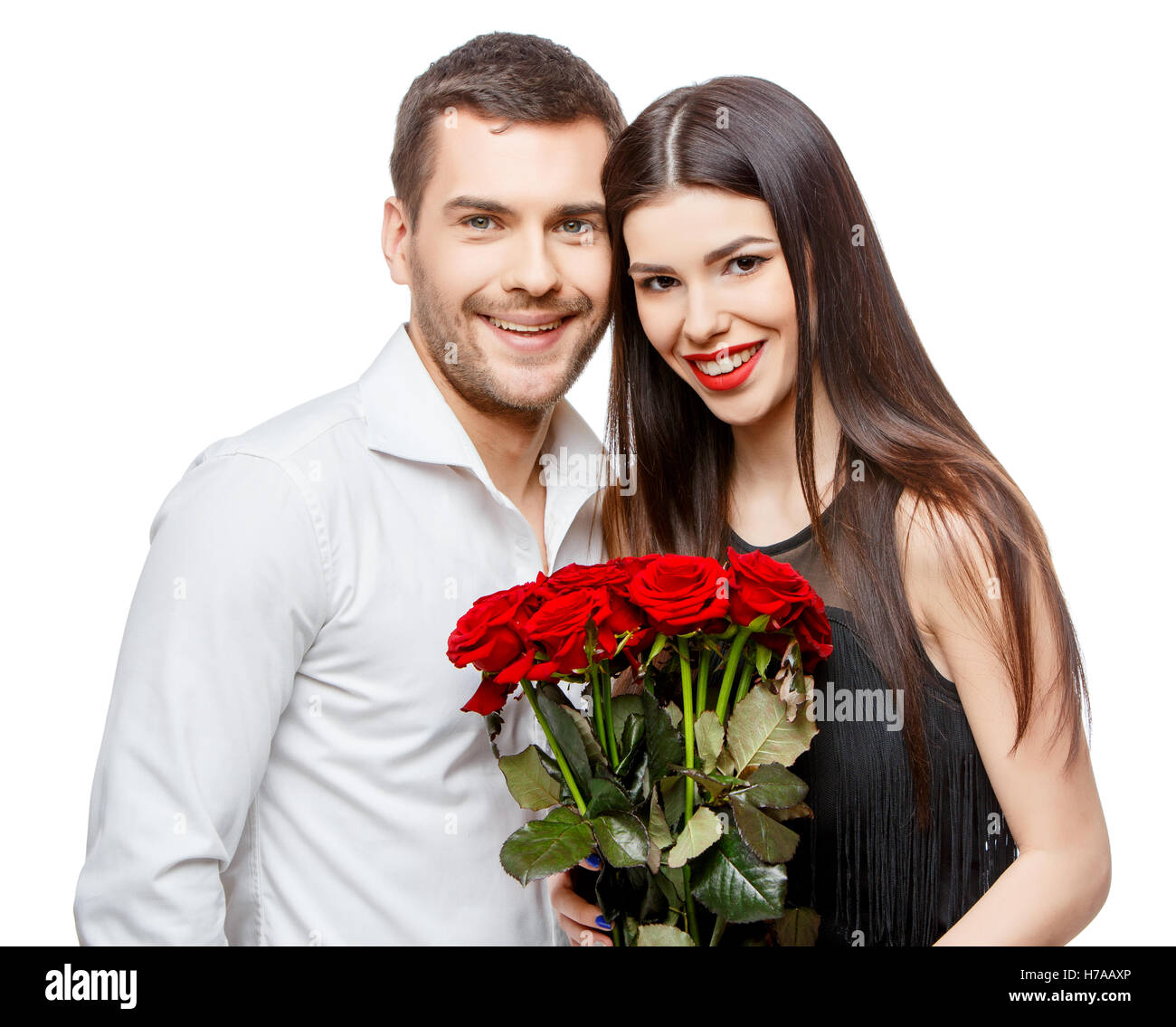 Young beautiful couple with flowers isolated on white Stock Photo - Alamy