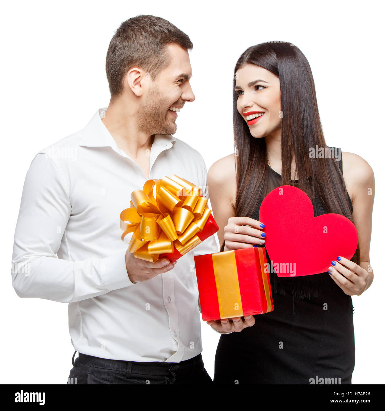 Partner Present Young beautiful couple with present isolated on white Stock Photo - Alamy