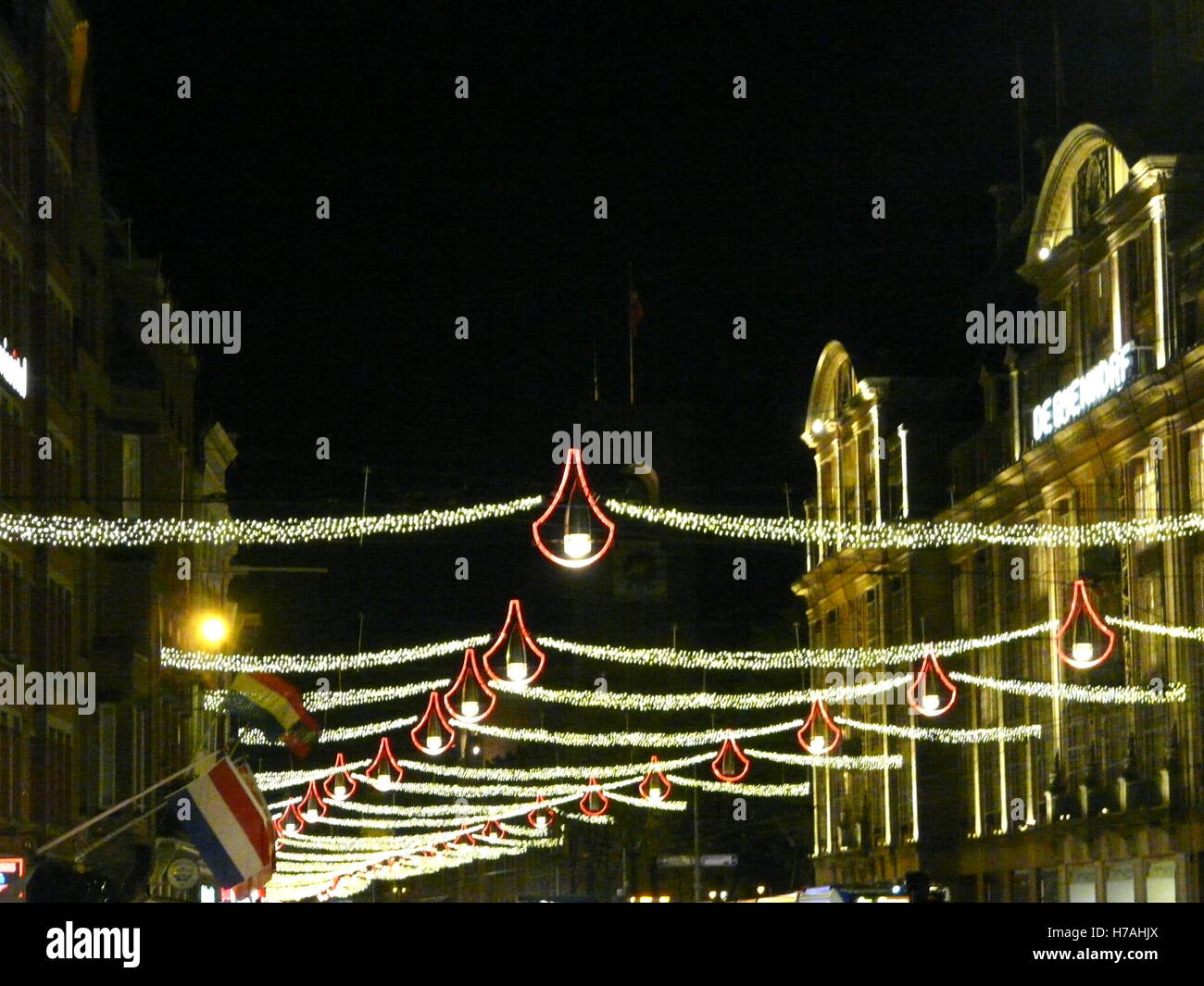 Christmas luminaries across a street in Dam square, Amsterdam, Holland