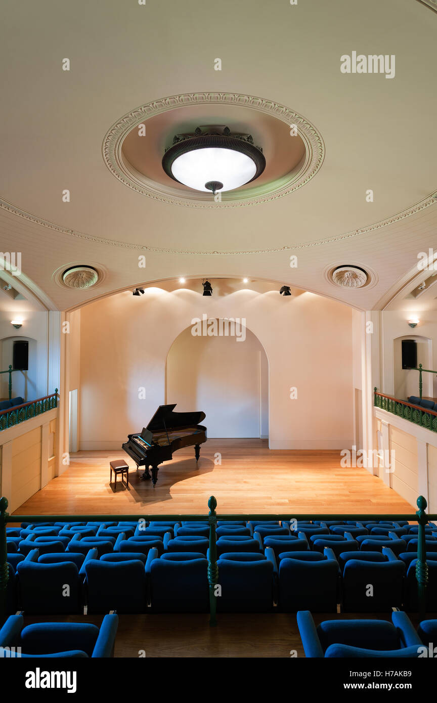 A grand piano on the stage of the Simpkins Lee Theatre, Oxford, England, UK Stock Photo
