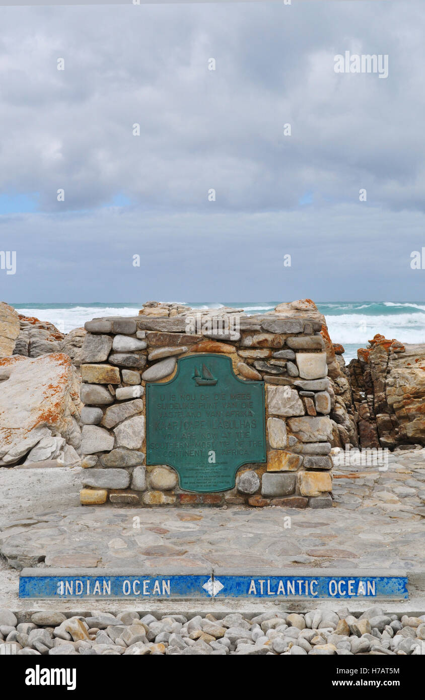 South Africa: the sign of Cape Agulhas, the southernmost tip of Africa where Atlantic and Indian Oceans meet Stock Photo