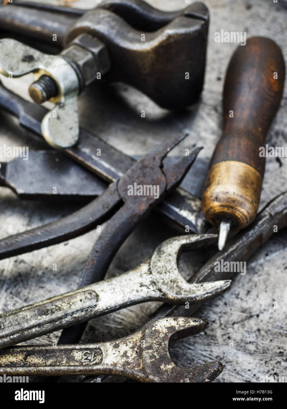 Old rusty small tools on metal background. 3rd Nov, 2016. Selective ...