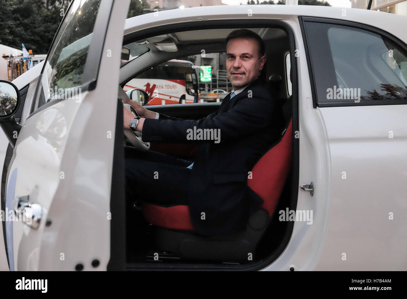 Tel Aviv, Israel. 3rd November, 2016. VIRGILIO CERUTTI, Head of Business Development Central Coordination, at Fiat Chrysler Automobiles, displays the M-15, a retail ready vehicle that complies with EU Euro 6 regulations, able to run on a blend of gasoline and methanol from 0 to 15%, at the Fuel Choices Summit exhibition. The fourth annual summit seeks to promote a revolution in alternative fuels and smart mobility, for a world free of oil, populated by clean, accessible and efficient means of transportation and to promote Israel’s goal of reducing 60% of the country’s oil consumption by 2025. Stock Photo