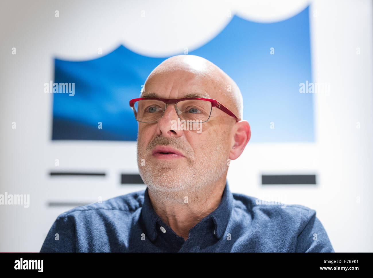 British musician Brian Eno speaking on his installation 'The Ship' during a press conference in the quay studio of the Elbphilharmonie in Hamburg, Germany, 3 November 2016. The installation is open between 4 November and 4 December 2016. PHOTO: DANIEL BOCKWOLDT/dpa Stock Photo