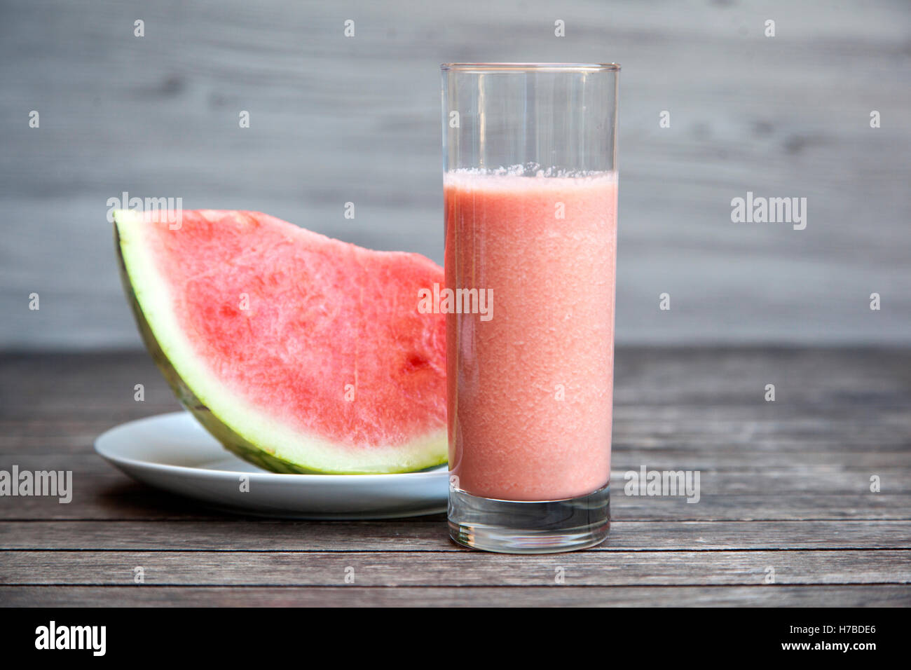 Fresh watermelon smoothie on old wooden table Stock Photo
