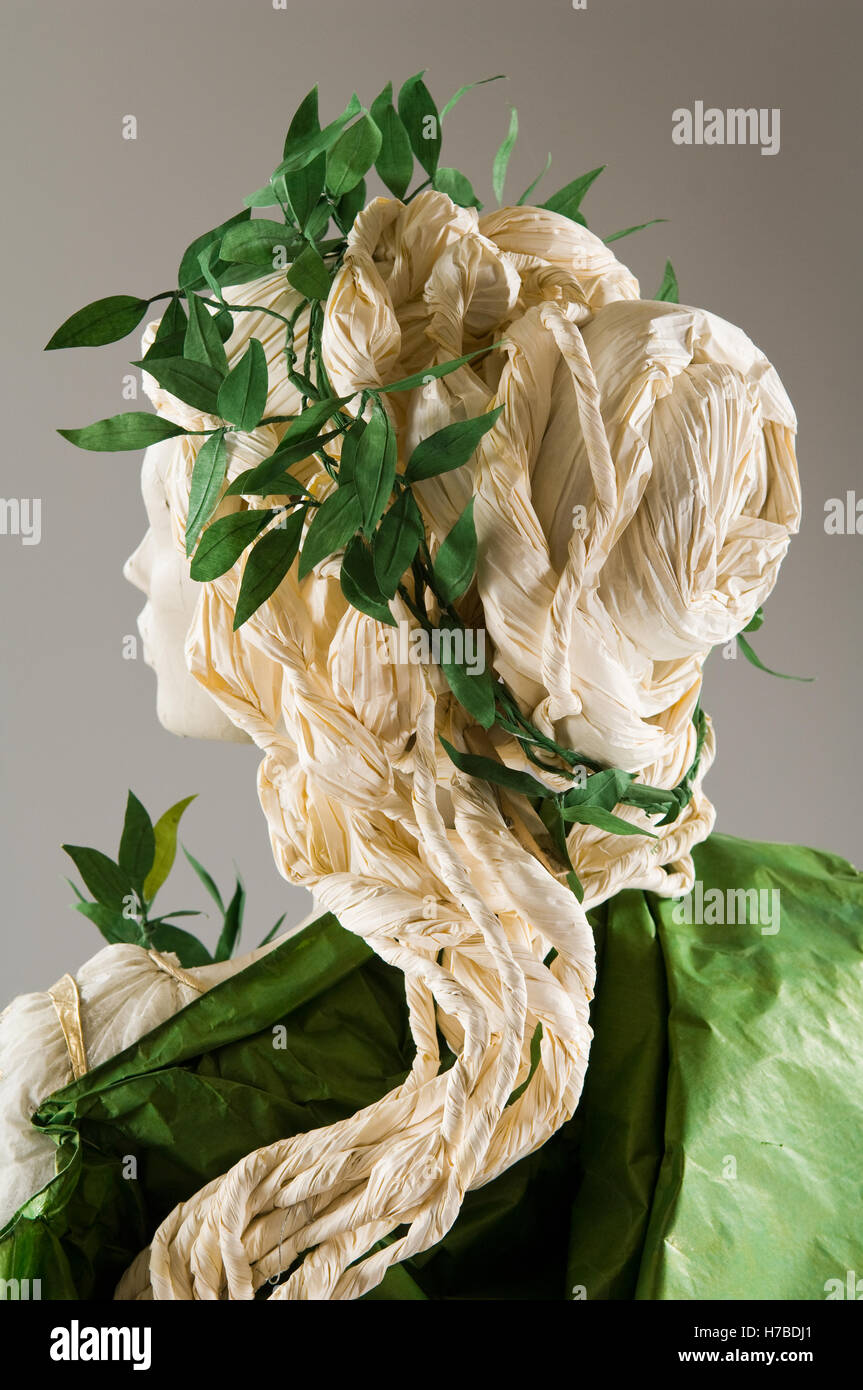 Leaf garland and green cape, historical replica paper dress by Isabelle de Borchgrave Stock Photo