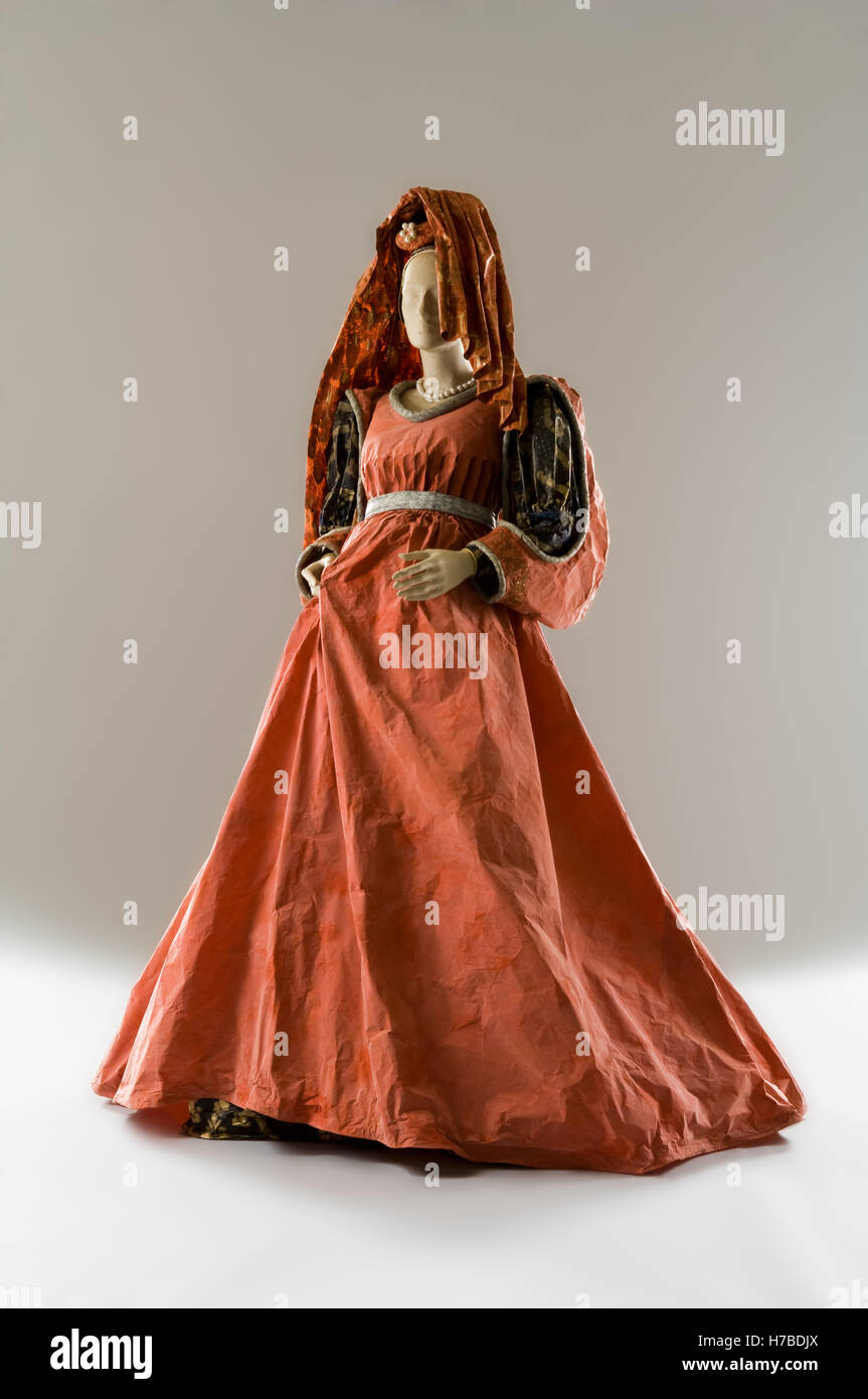 Full-length orange historical replica paper dress with contrasting sleeves and mantilla, by Isabelle de Borchgrave Stock Photo
